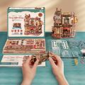RoboTime 3D-Puzzle Spieluhr aus Holz
 Kaffeefabrik